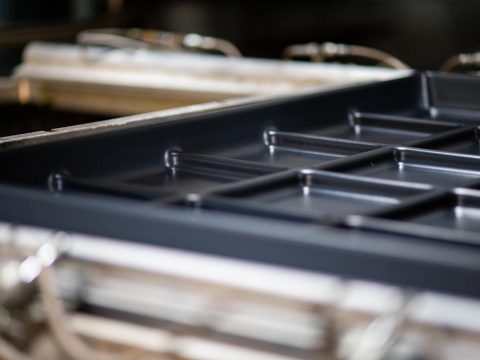 custom thermoformed plastic trays and pans for industrial applications